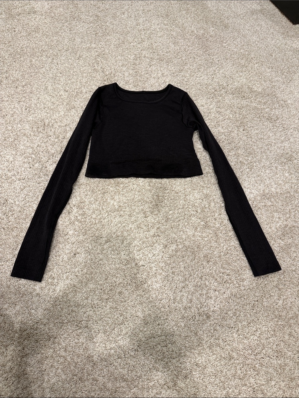 Lululemon cropped long sleeve Ebb to Street top. Built in Bra. Size 4
